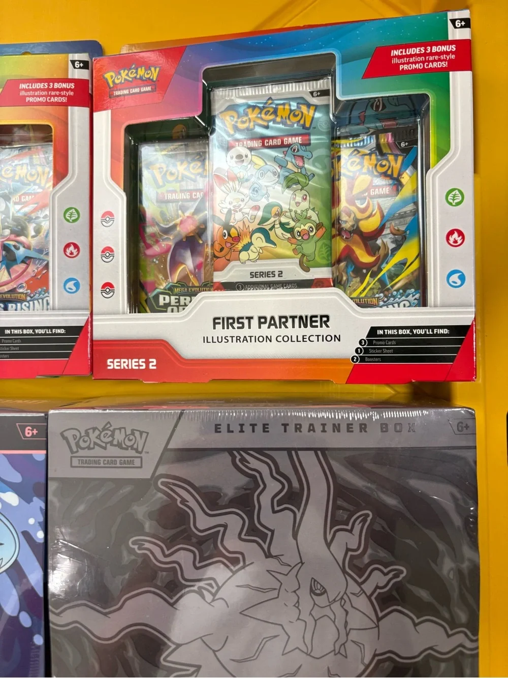 Pokemon Booster & Elite Trainer Box Assortment with Yellow Packaging